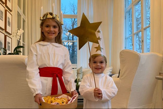 Princess Estelle and Prince Oscar celebrate Saint Lucia with a basket of buns
